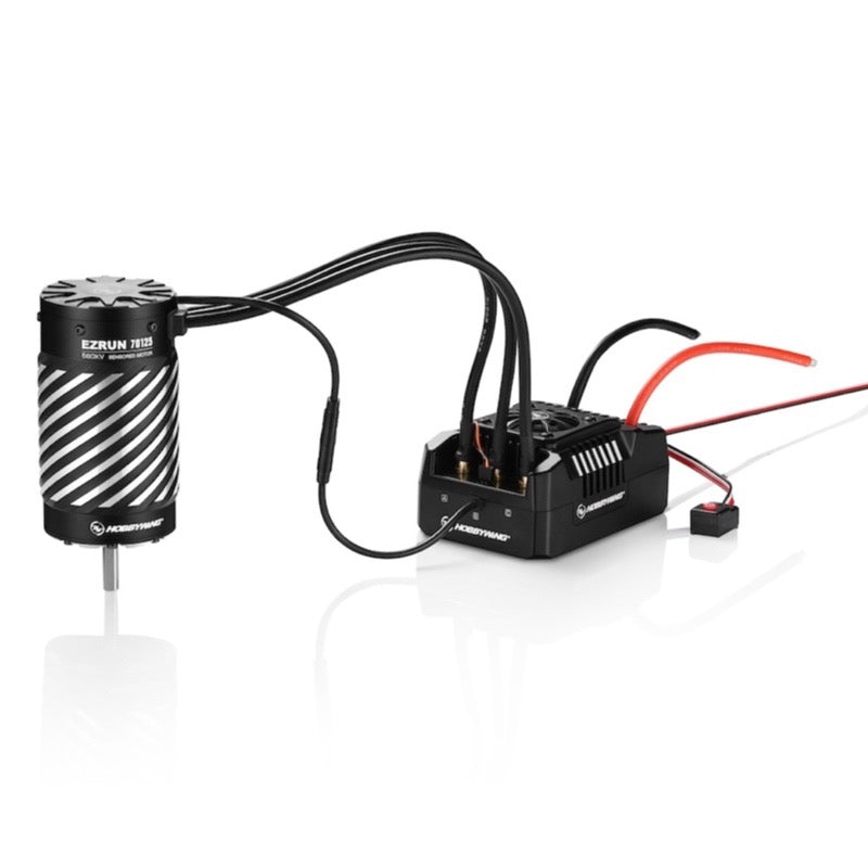 Black and white electronic speed control and motor with wires on a white background