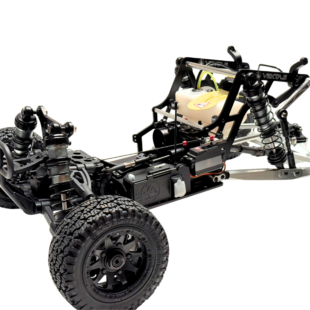 Model of a VEKTA buggy chassis with suspension and wheels on a white background