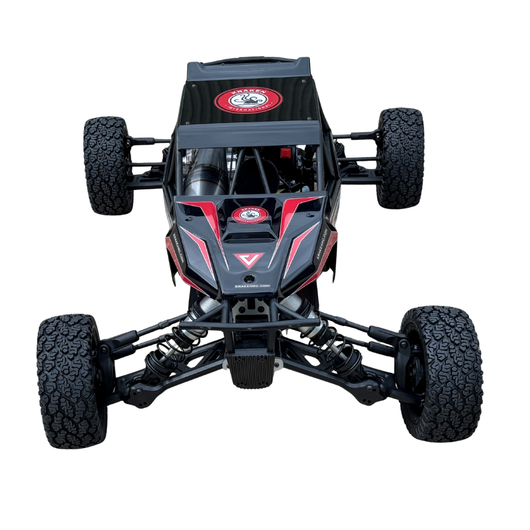Black and red off-road vehicle chassis with visible branding on a white background