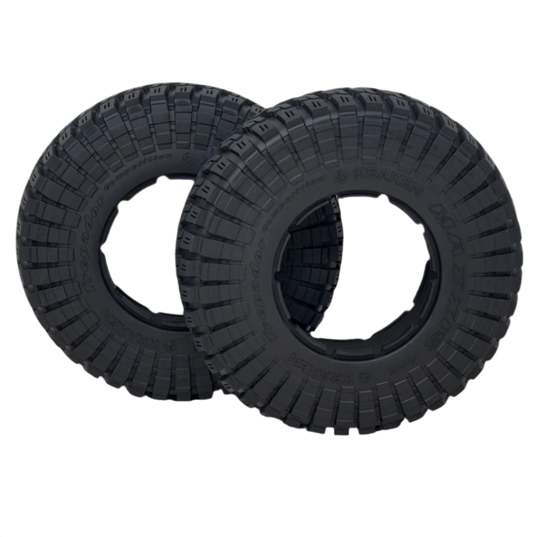 Two black tires with tread patterns on a transparent background