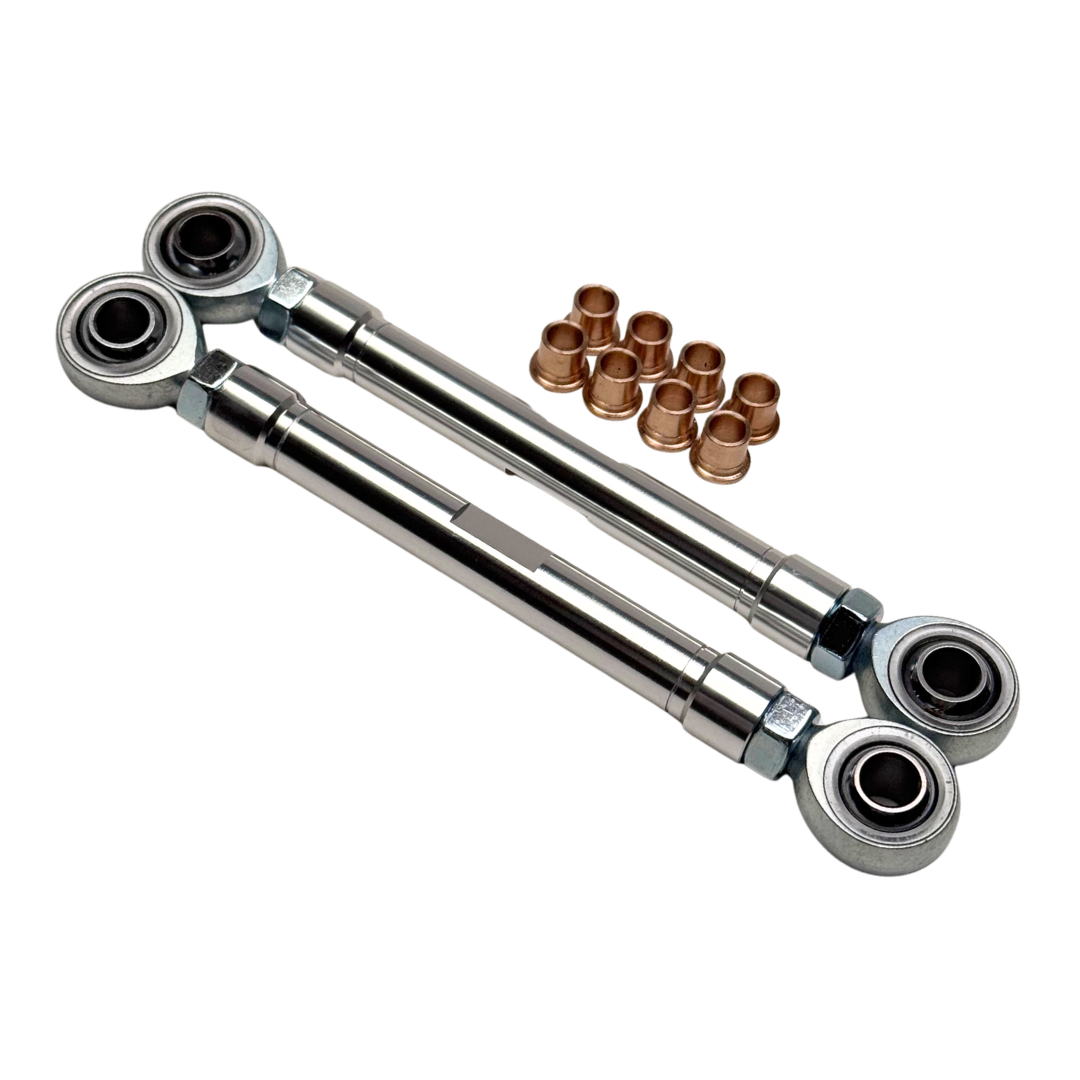 Set of metal rod ends with bushings on a white background