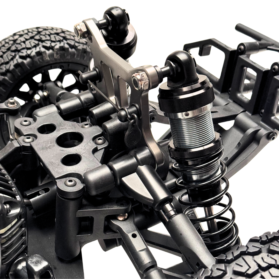 Close-up of a detailed metal suspension system on a model vehicle