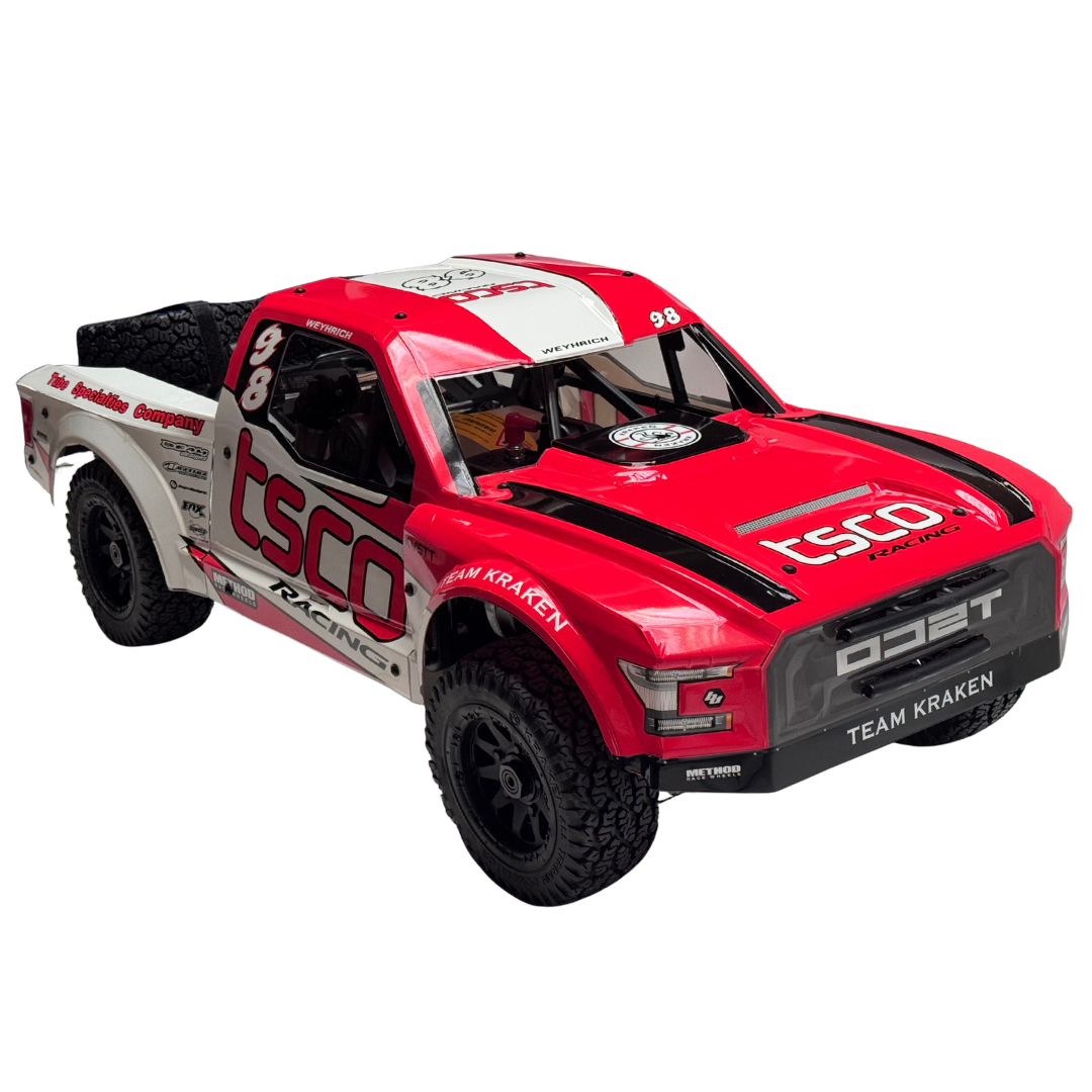 Red and white model truck with visible branding on a white background