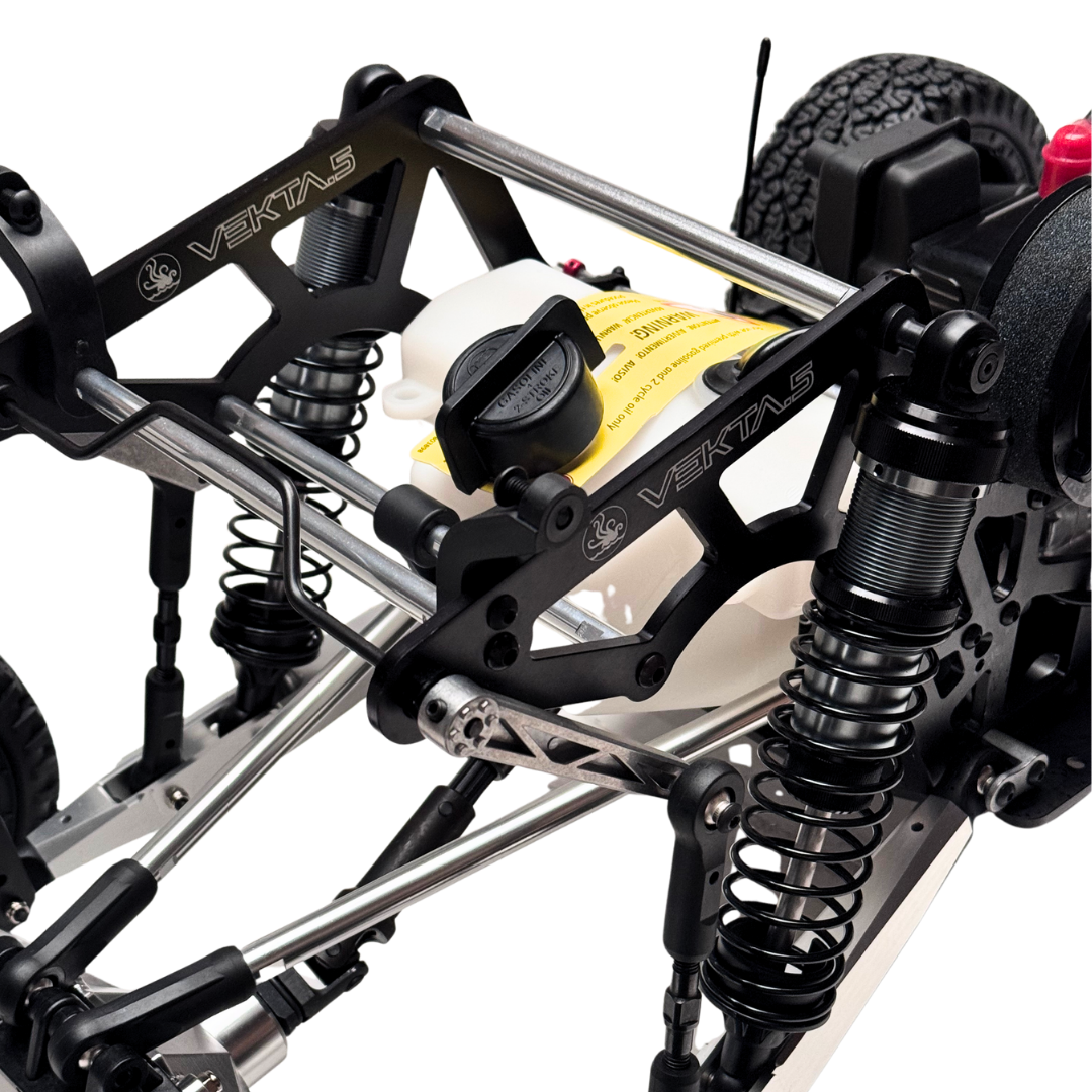 Close-up of a mechanical vehicle chassis with visible branding on a white background