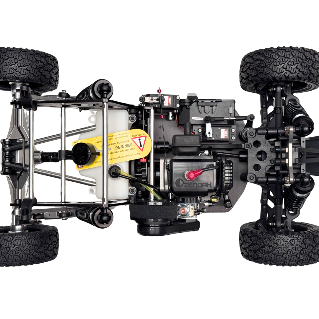 Close-up of a mechanical vehicle chassis with visible branding on a white background