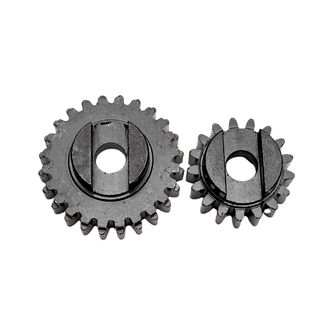 Two metal gears on a white background