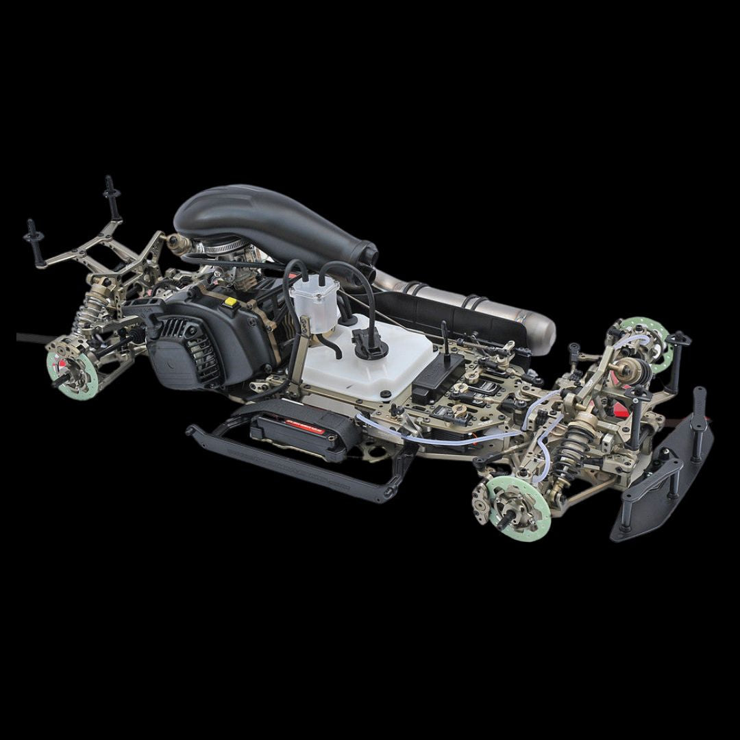 MCD Racing Duox against black background with engine and servos installed