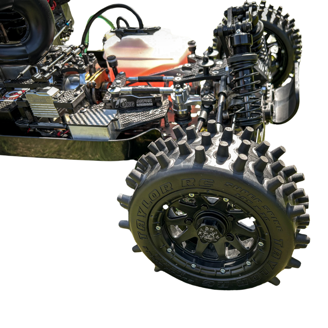 Close-up of a mechanical model with gears and a wheel on a white background